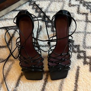 Knee high strapped heeled sandals